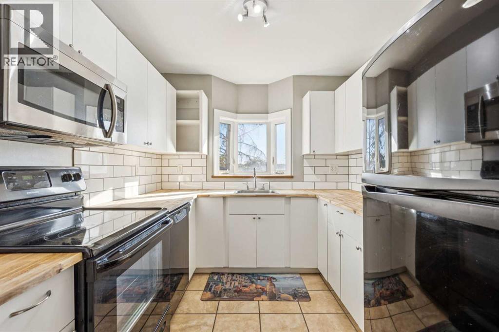 215, 335 Garry Crescent NE