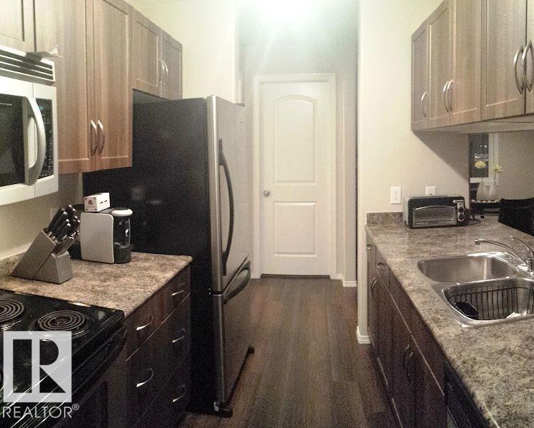 #345 50 Woodsmere CL