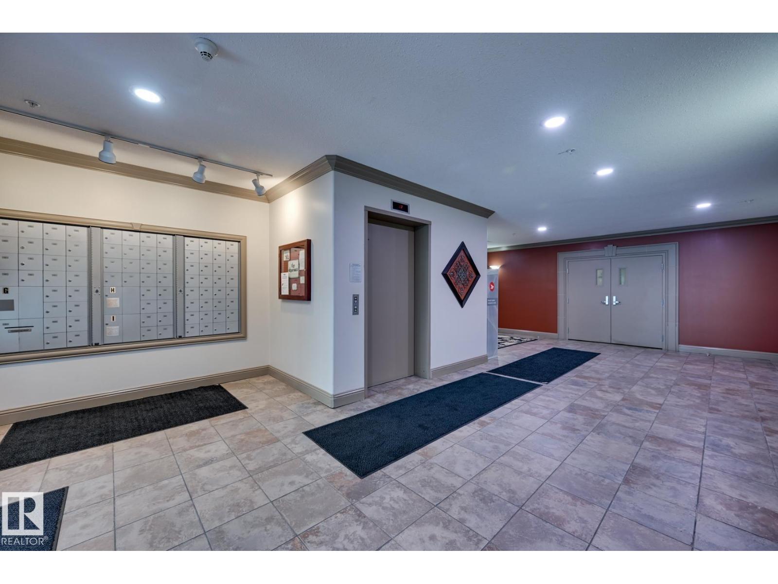 #416 1406 HODGSON WY NW