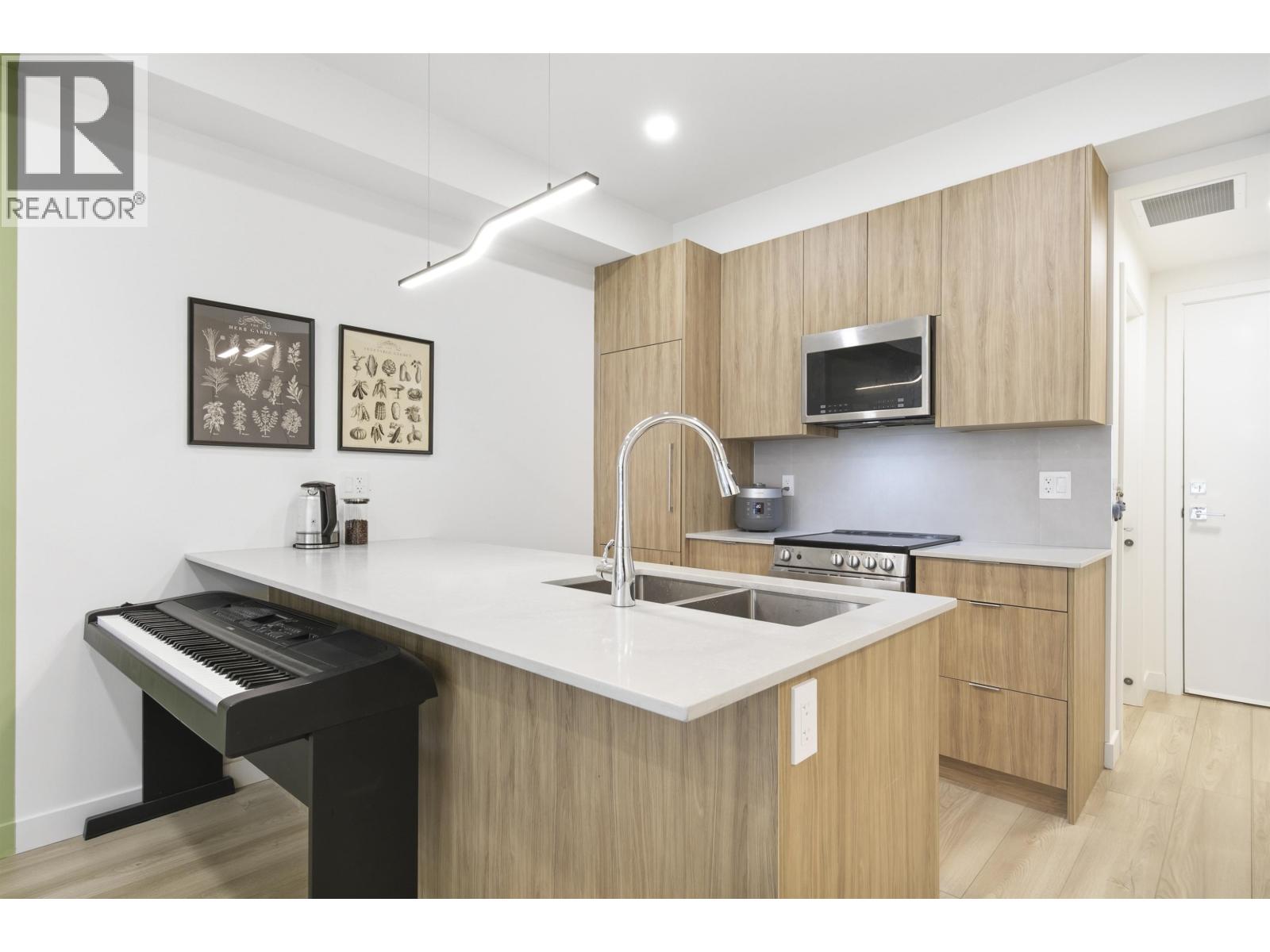 303 11913 BURNETT STREET