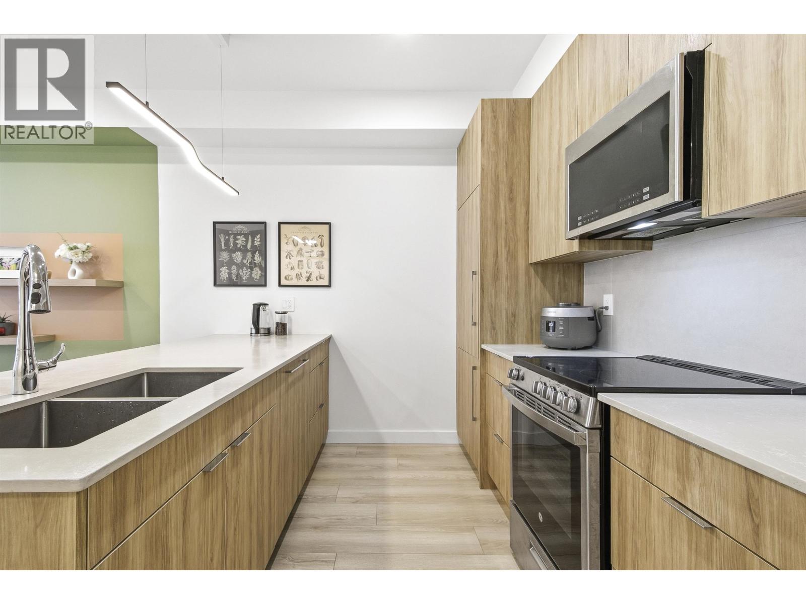 303 11913 BURNETT STREET