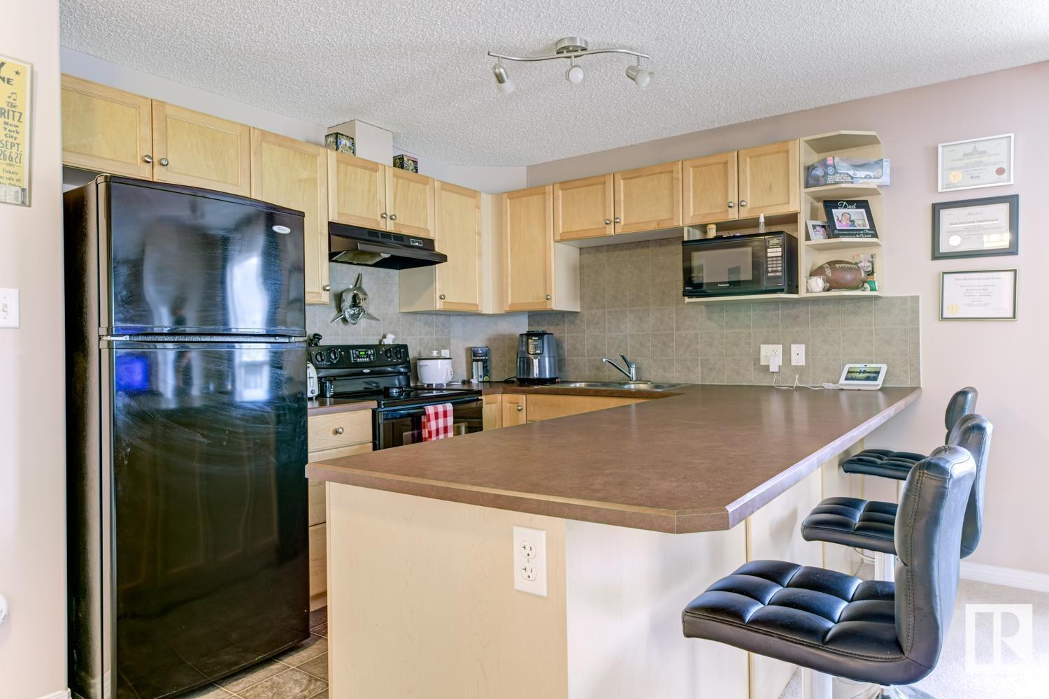 #1205 7339 SOUTH TERWILLEGAR DR NW