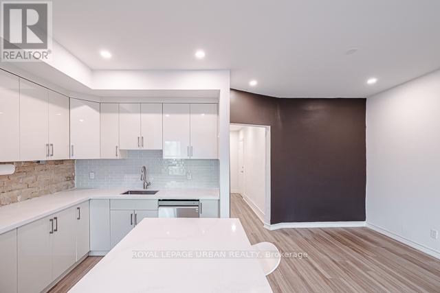 3 - 989 QUEEN STREET E