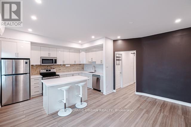 3 - 989 QUEEN STREET E