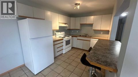 8, 6203 Bowness Road NW Calgary AB T3B0E2