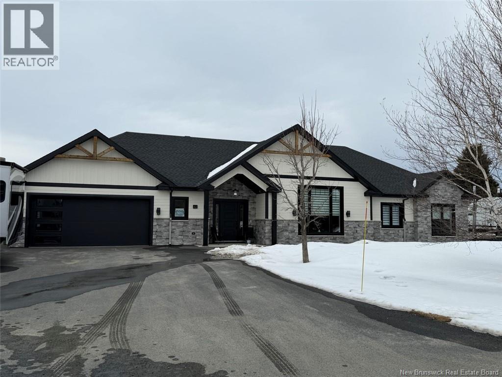 Photo 1 of 28 — 42 Chouinard Street, Saint-Quentin, NB E8A1L3