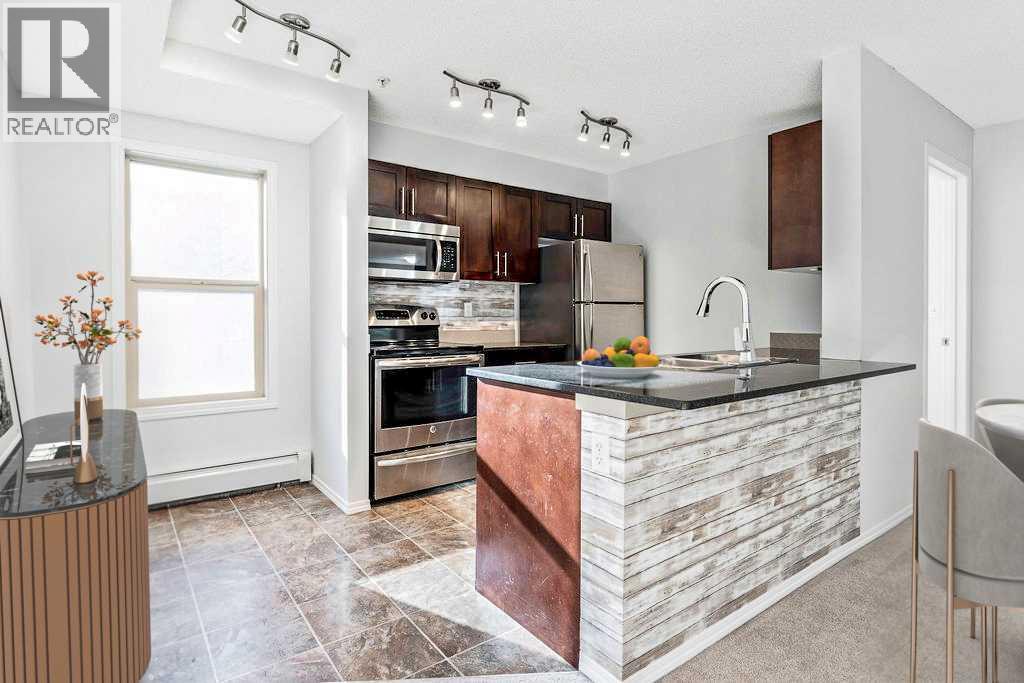 9113, 403 Mackenzie Way SW