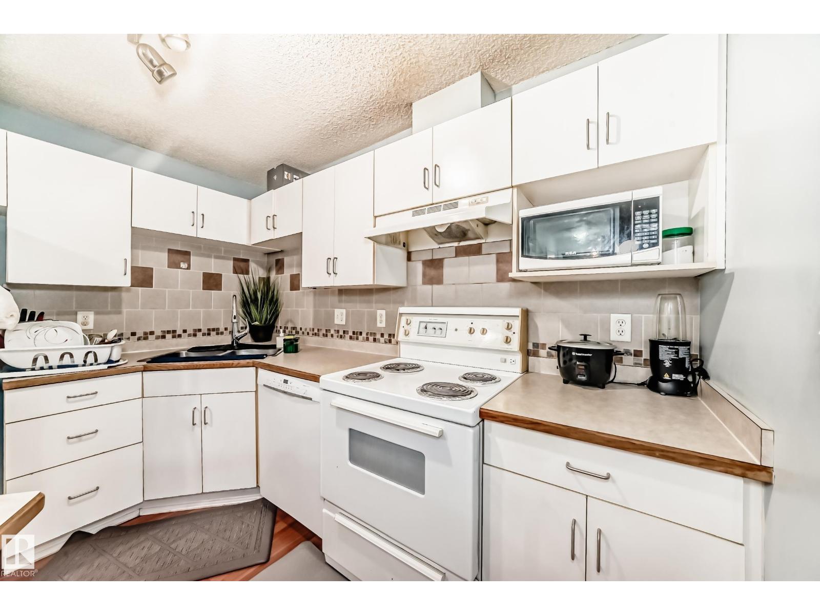 #108 10535 122 ST NW