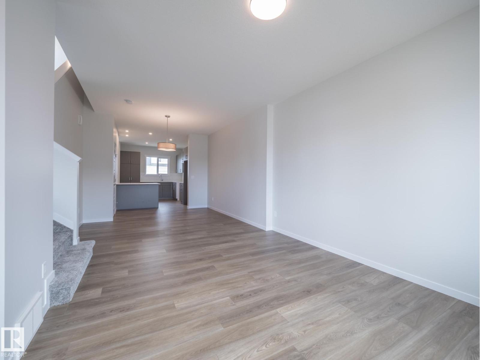 604 174 AV NE
