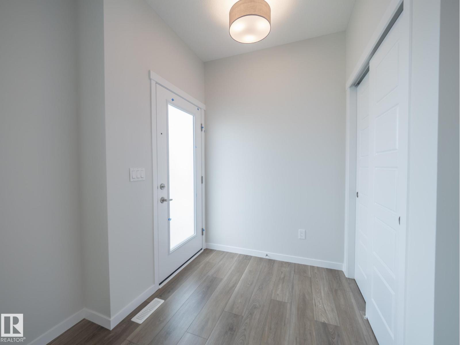 604 174 AV NE
