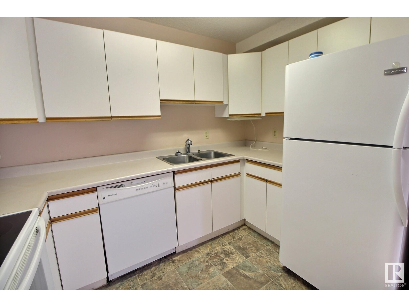 #102 18012 95 AV NW