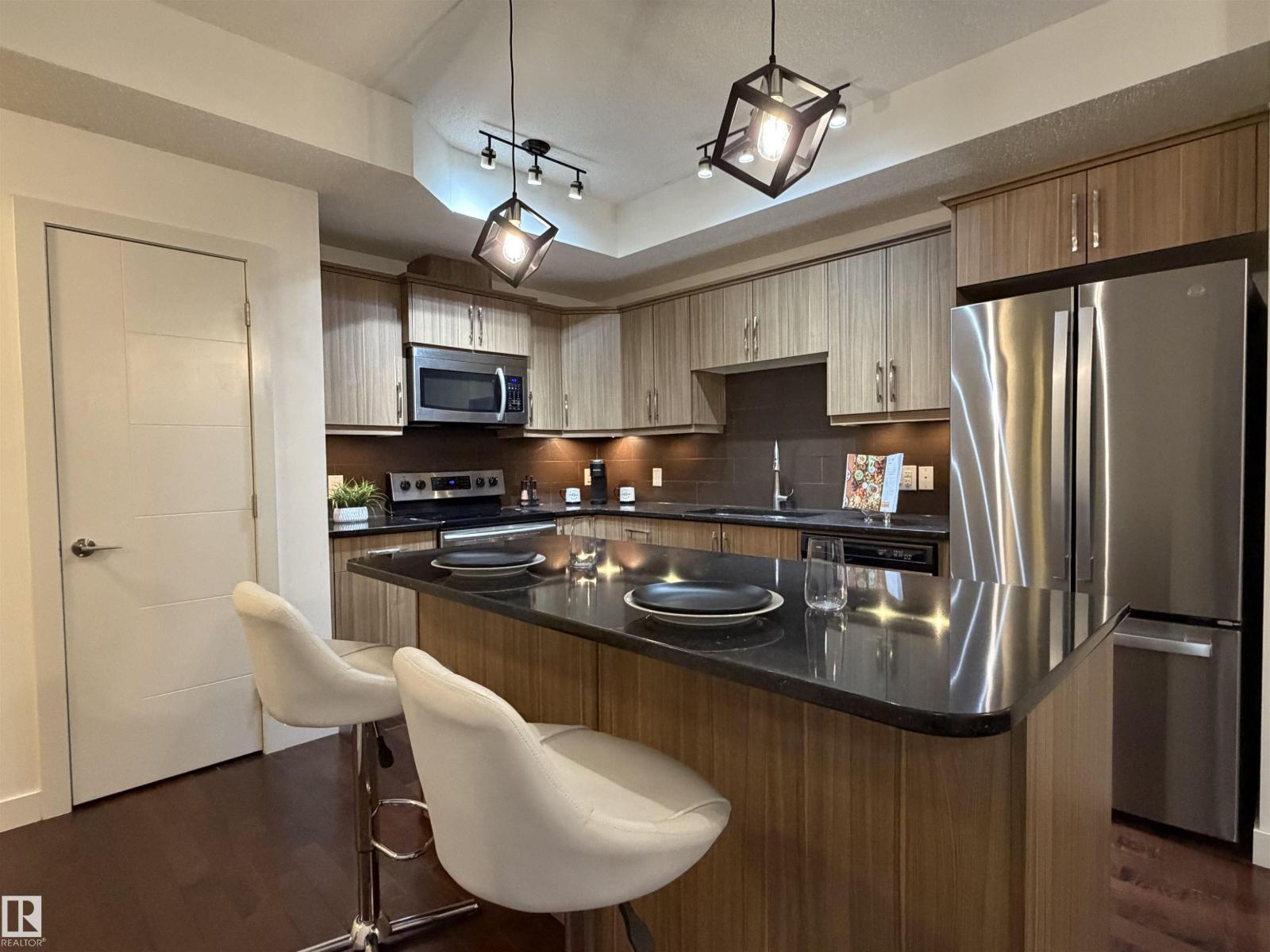 #115 10523 123 ST NW