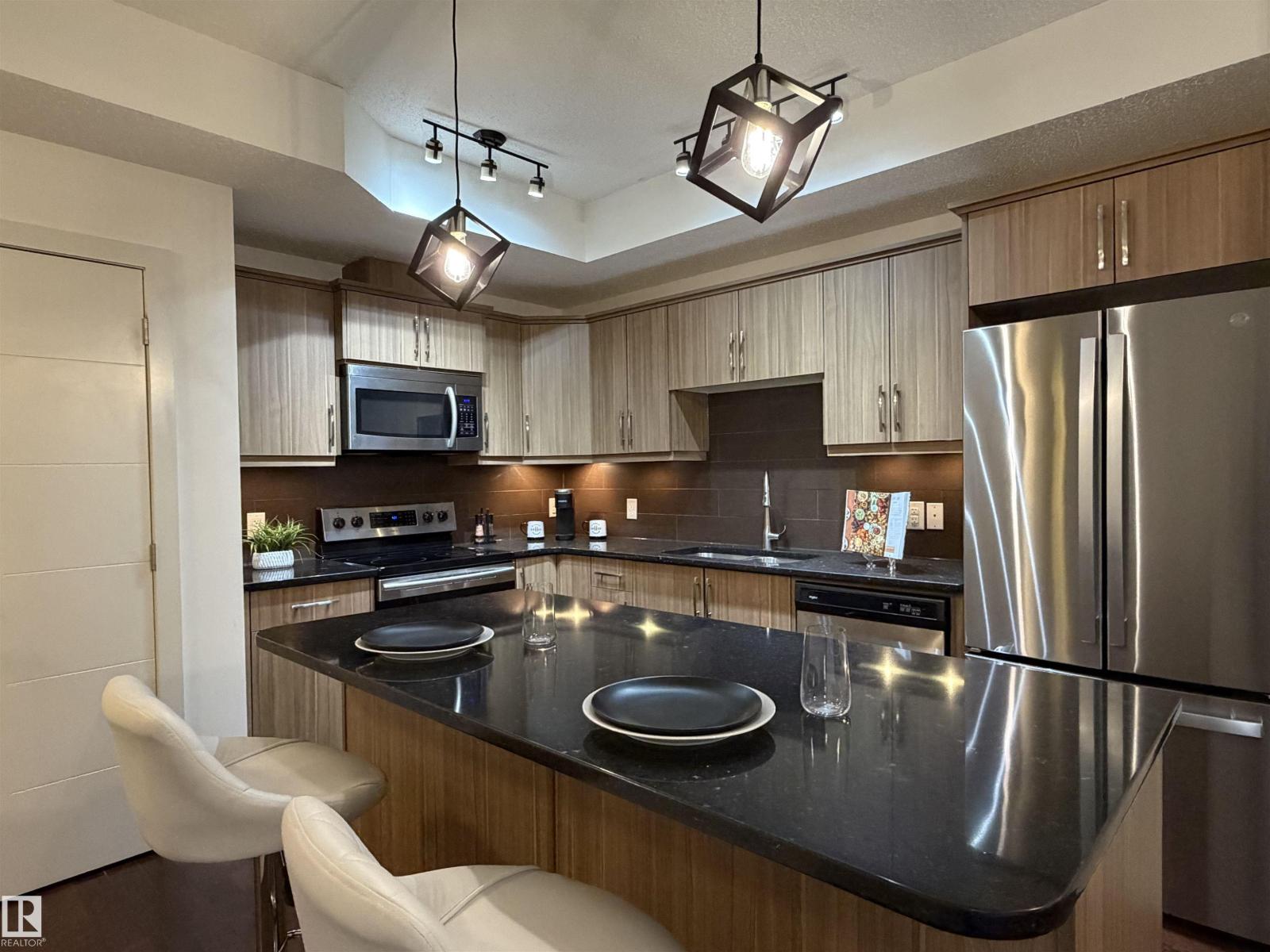 #115 10523 123 ST NW