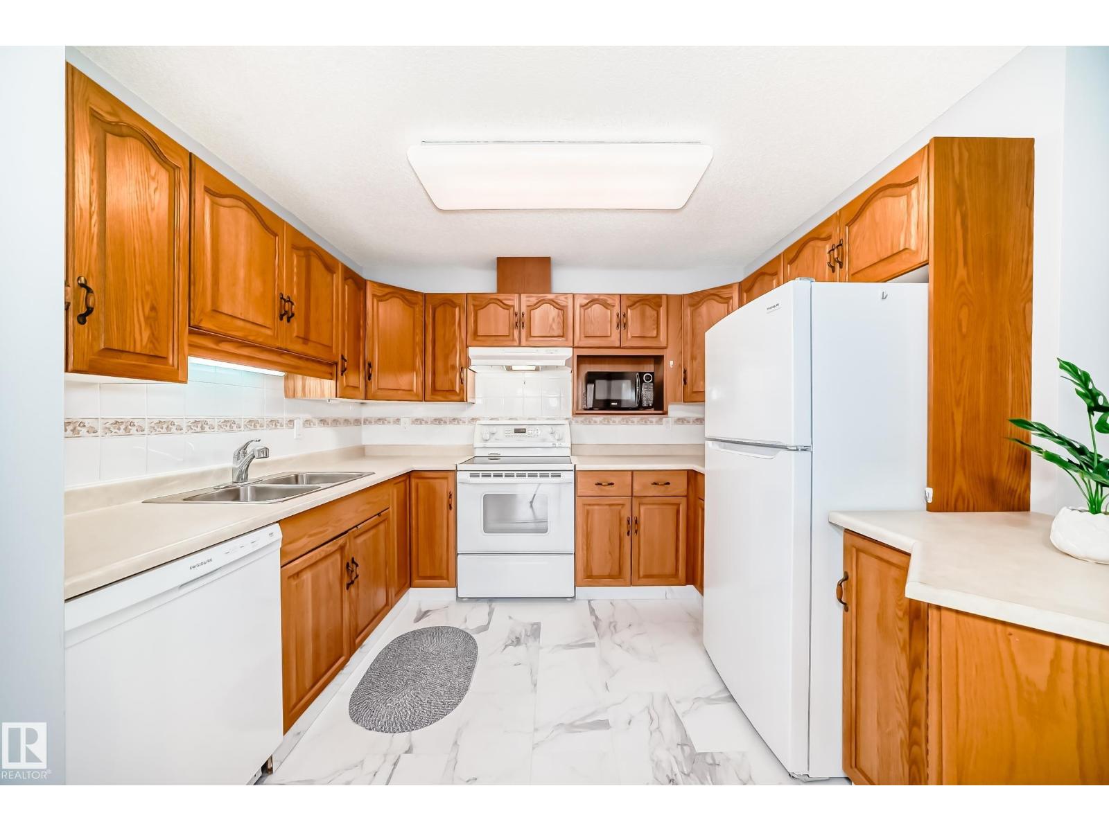 #302 13450 114 AV NW