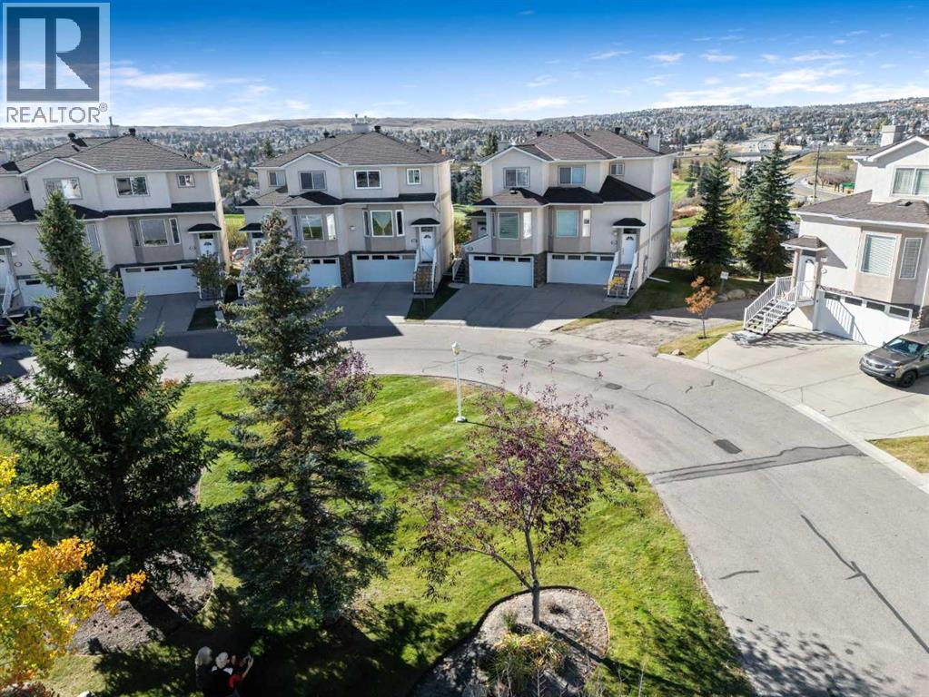 143 Country Hills Gardens NW
