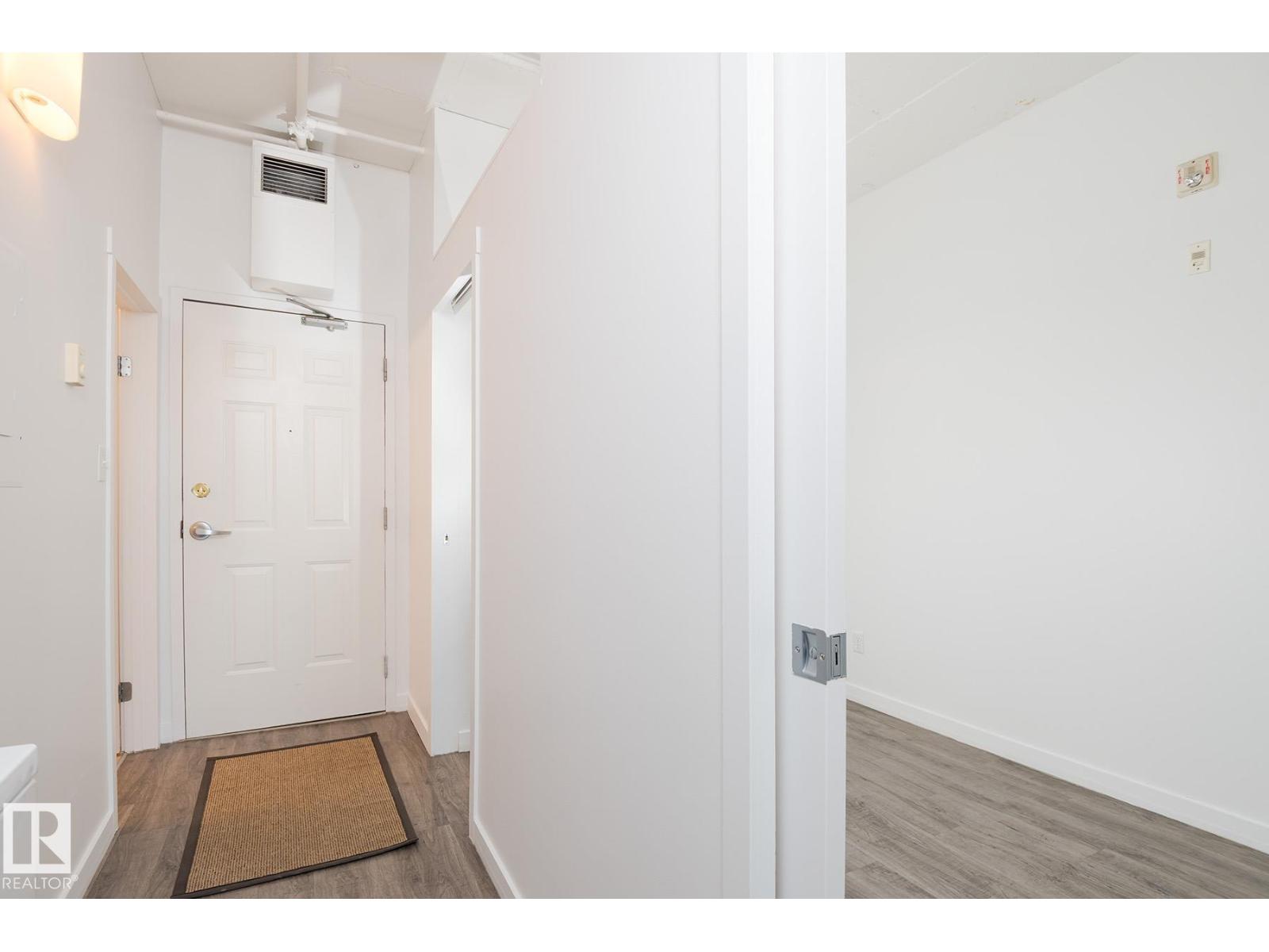 #910 10024 JASPER AV NW