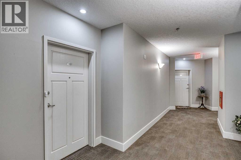 213, 77 George Fox Trail W