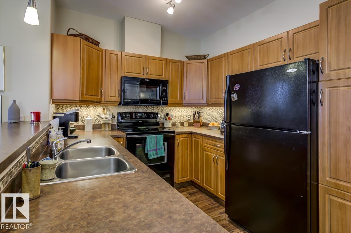 #210 2503 HANNA CR NW