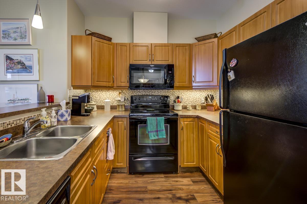 #210 2503 HANNA CR NW