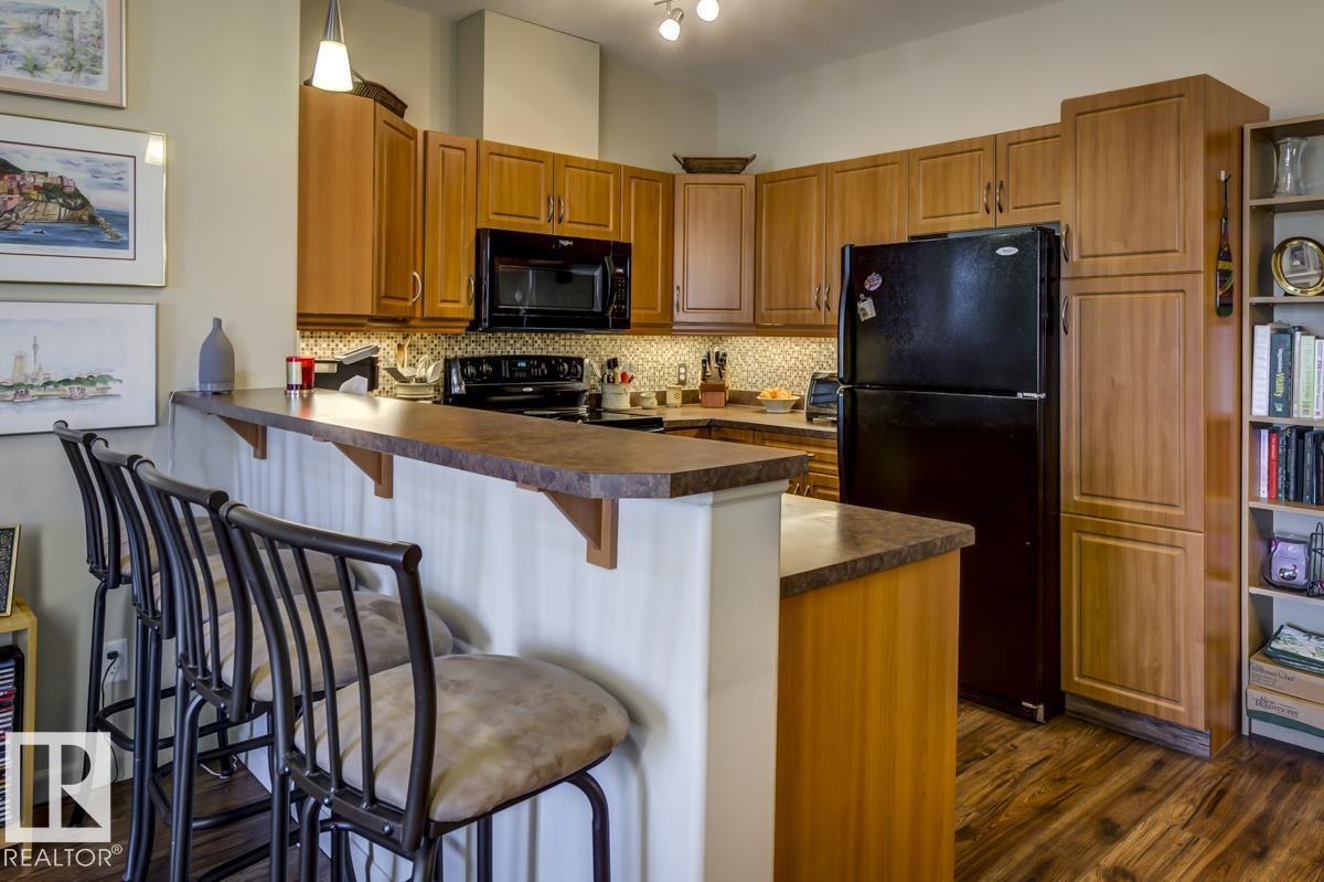 #210 2503 HANNA CR NW