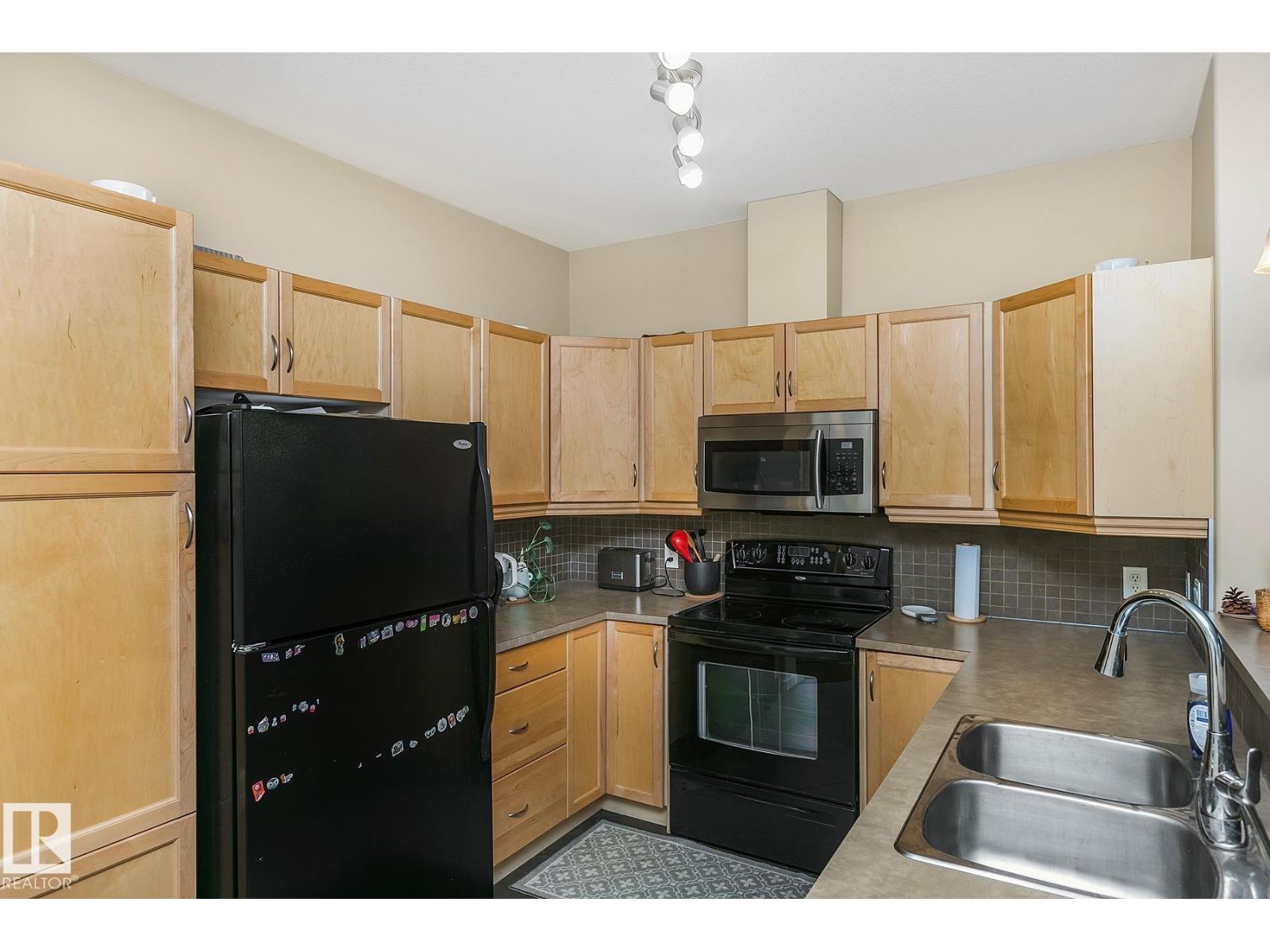 #212 2503 HANNA CR NW