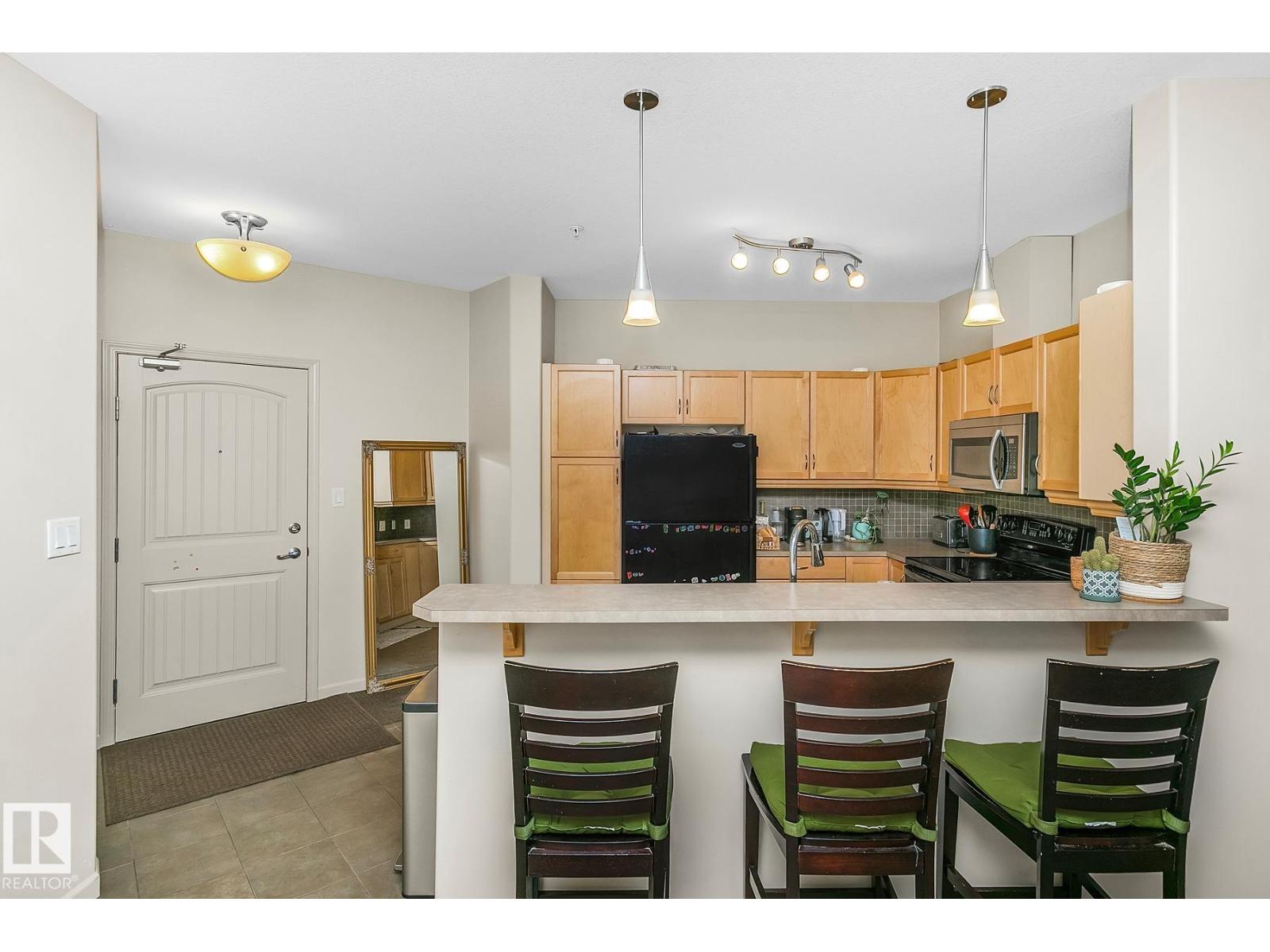 #212 2503 HANNA CR NW