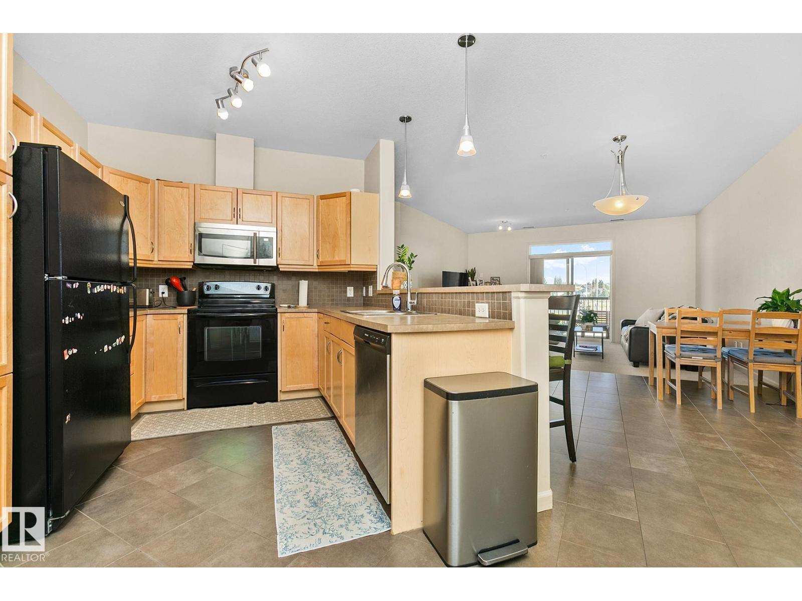 #212 2503 HANNA CR NW