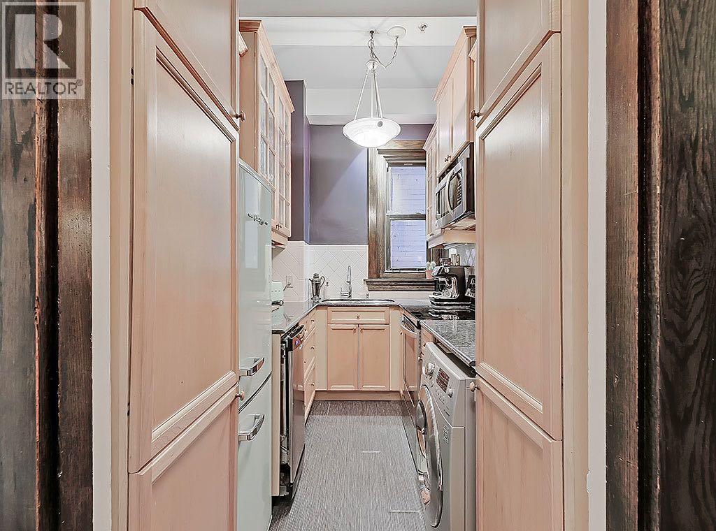 100, 804 18 Avenue SW