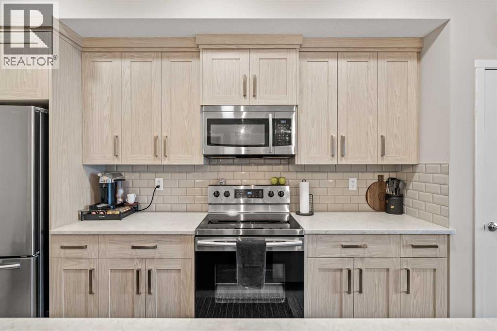 205, 370 Harvest Hills Common