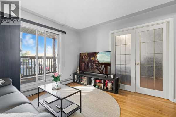 206, 104 24 Avenue SW