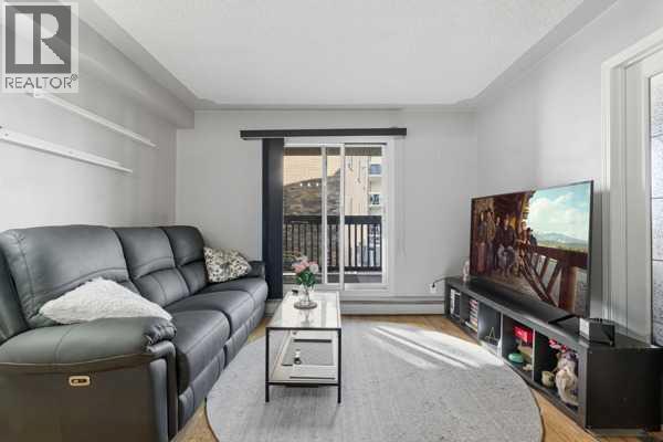 206, 104 24 Avenue SW