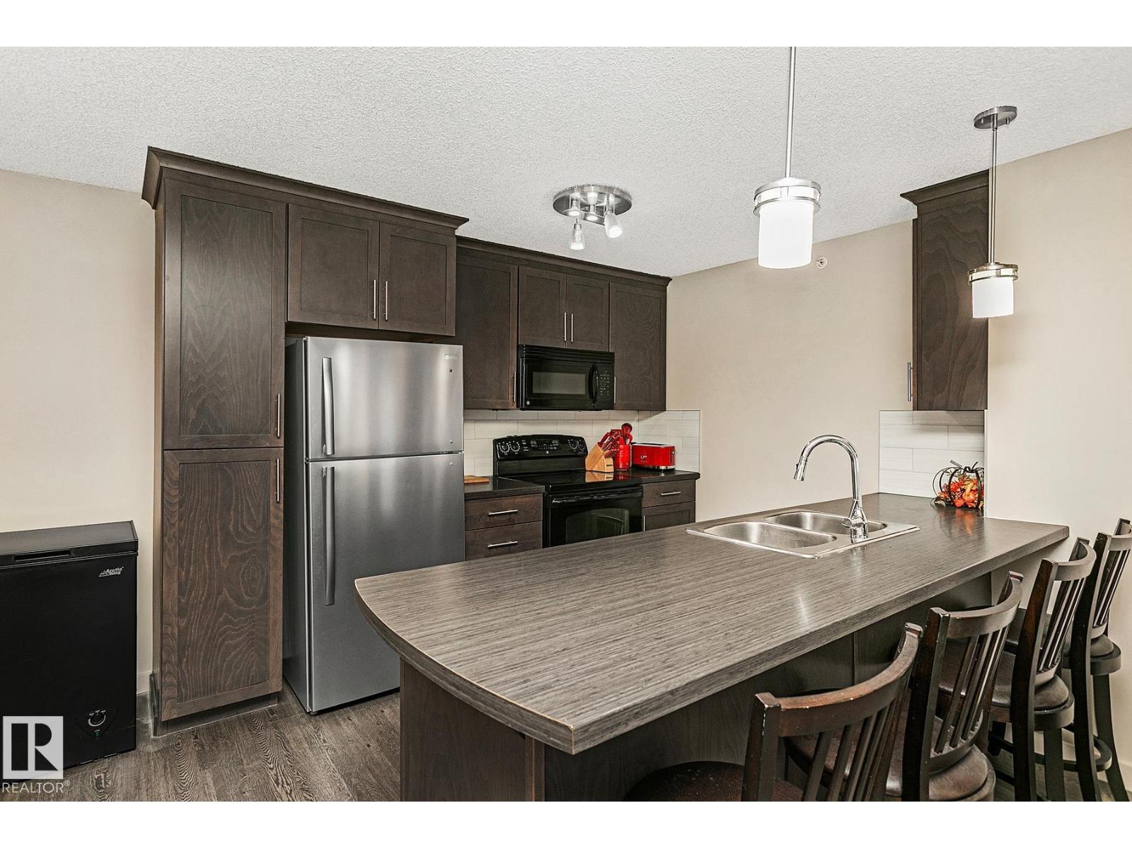 #413 6084 STANTON DR SW