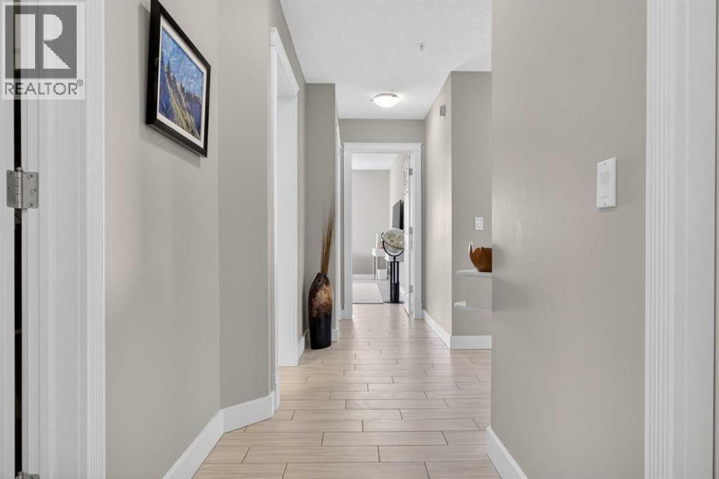 202, 200 Patina Court SW