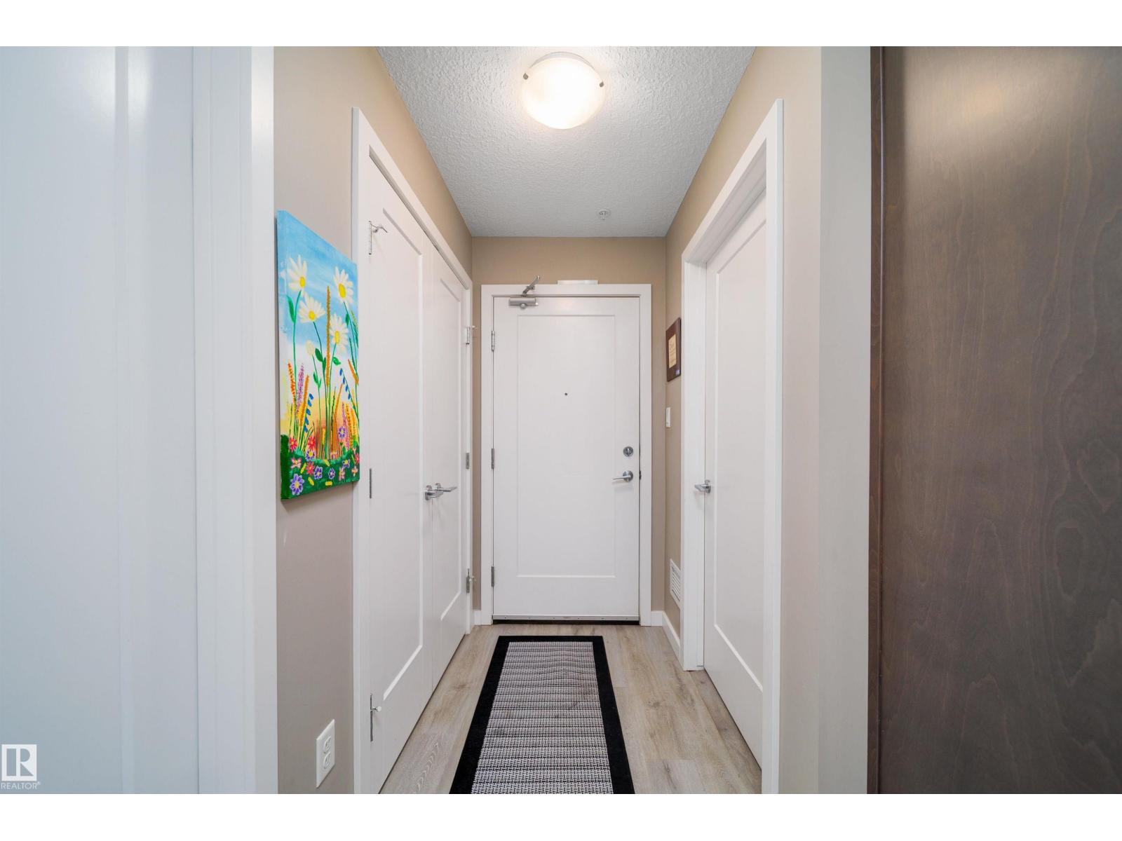 #125 5504 SCHONSEE DR NW