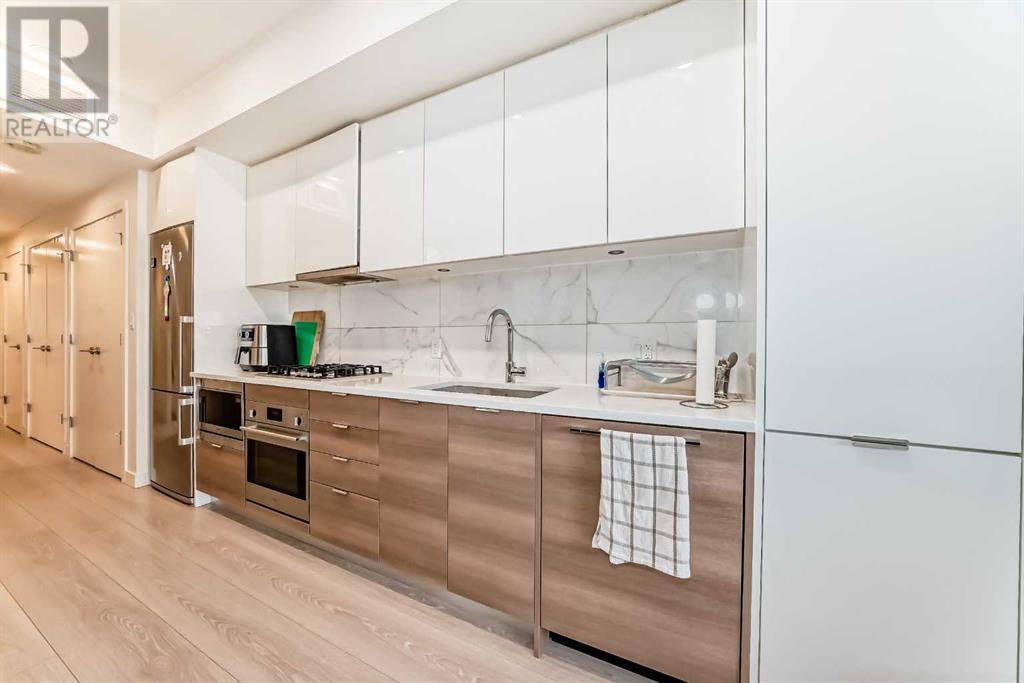 213, 138 Waterfront Court SW