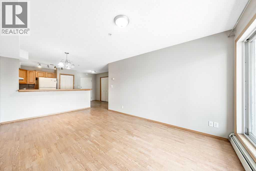 103, 92 Saddletree Court NE