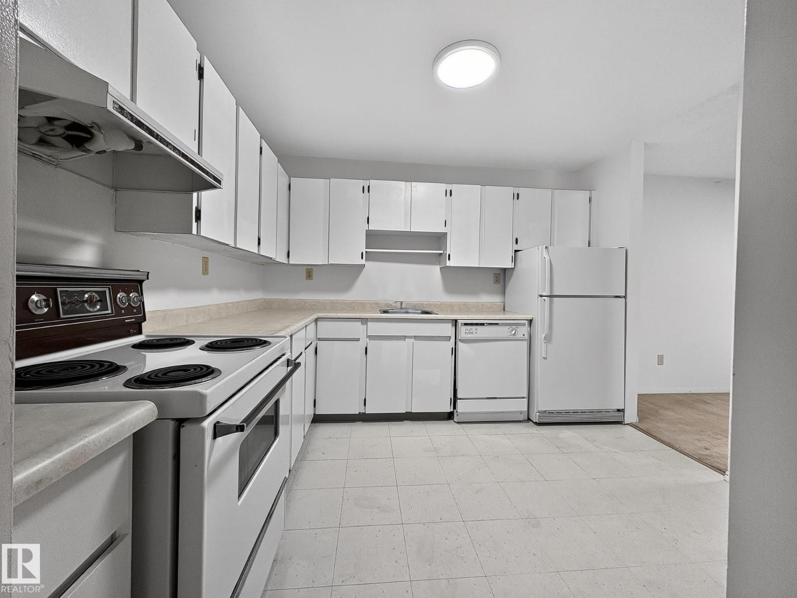 #406 2620 MILL WOODS RD E NW