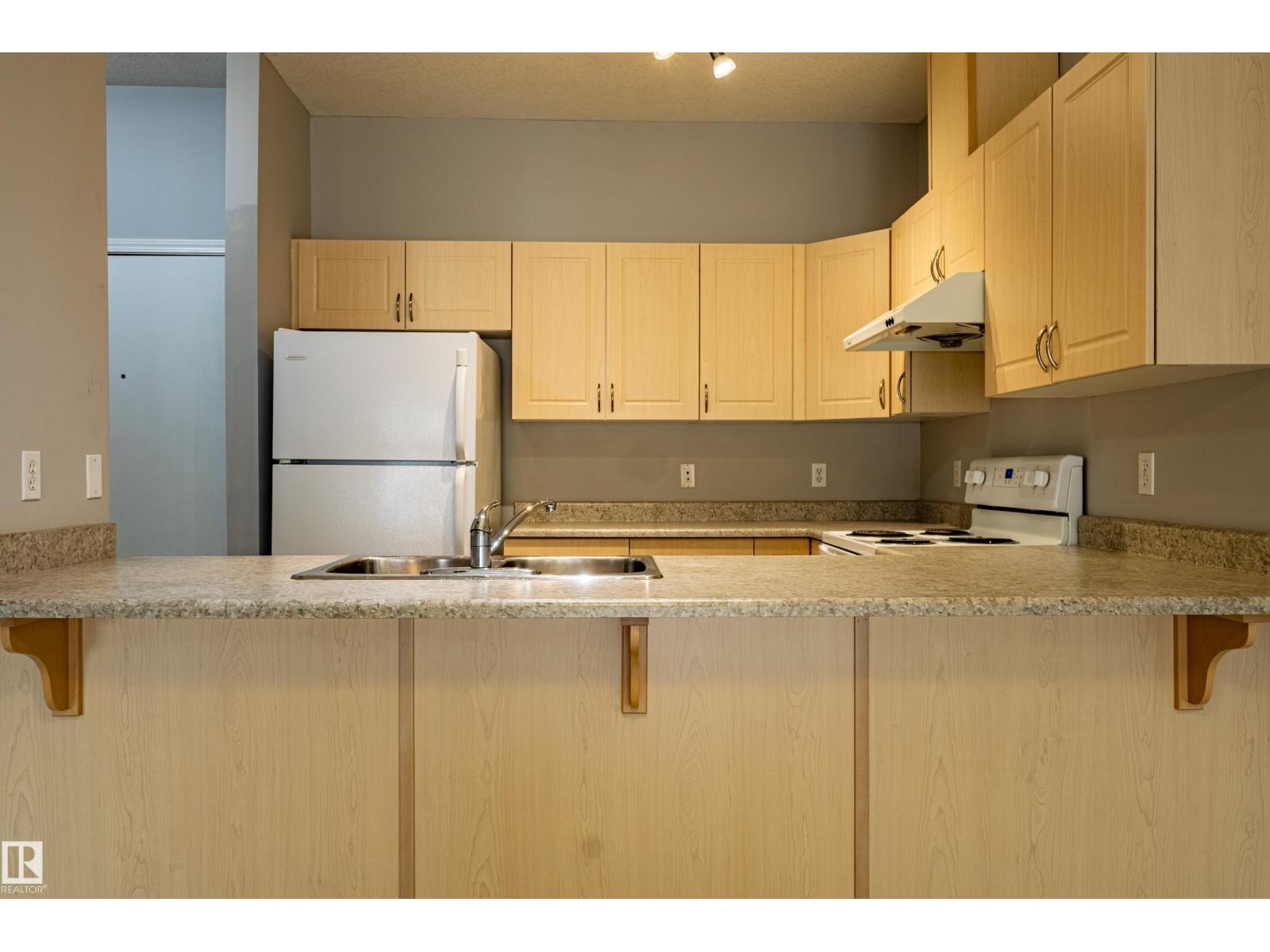 #412 4304 139 AV NW