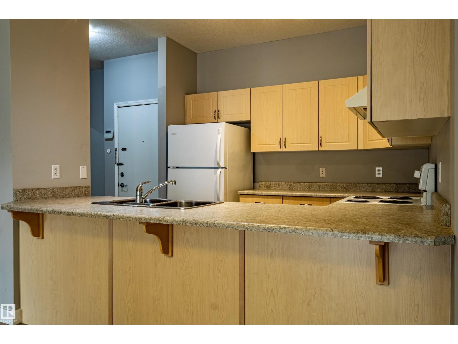 #412 4304 139 AV NW