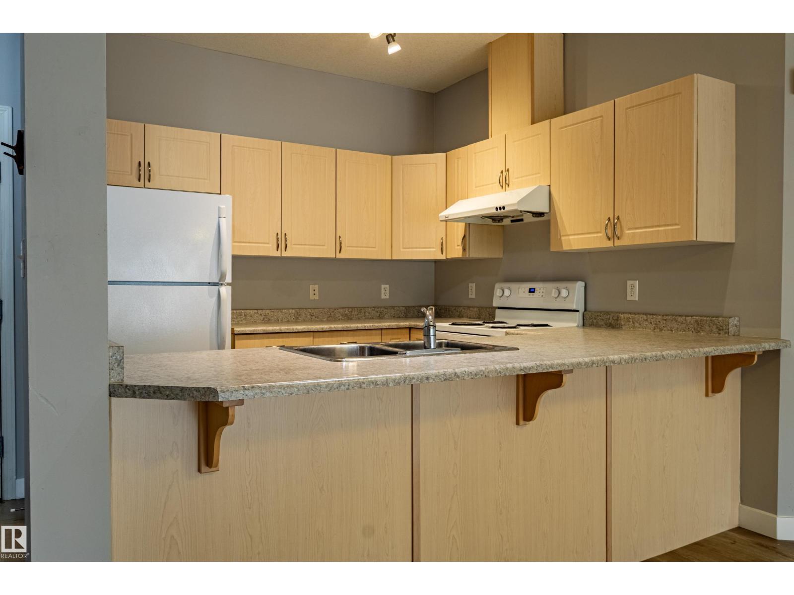 #412 4304 139 AV NW