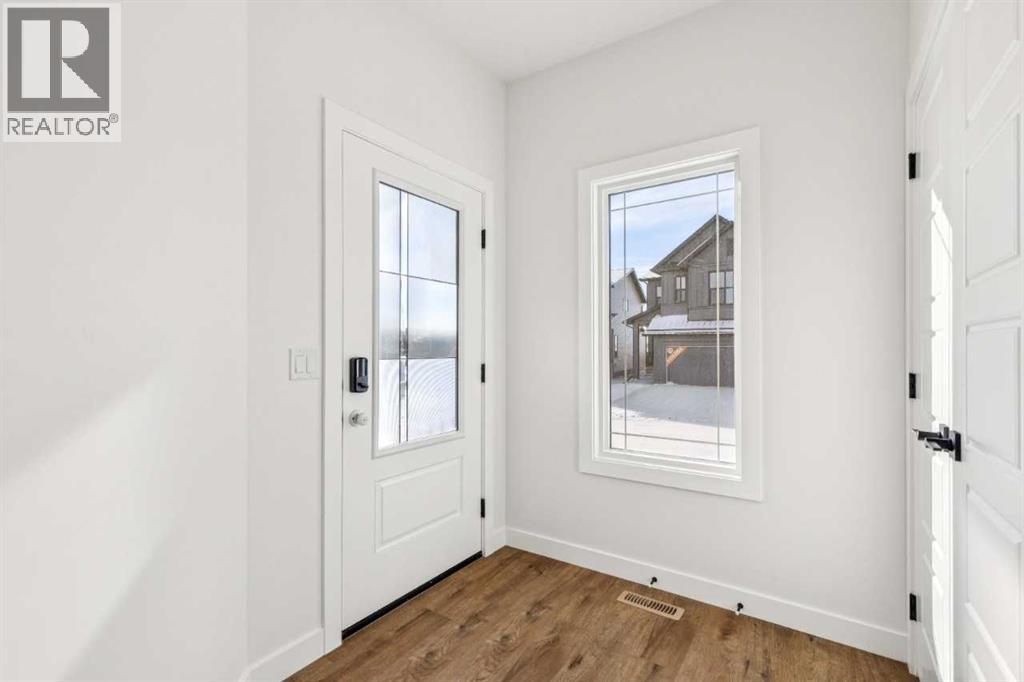 571 Buffaloberry Manor SE