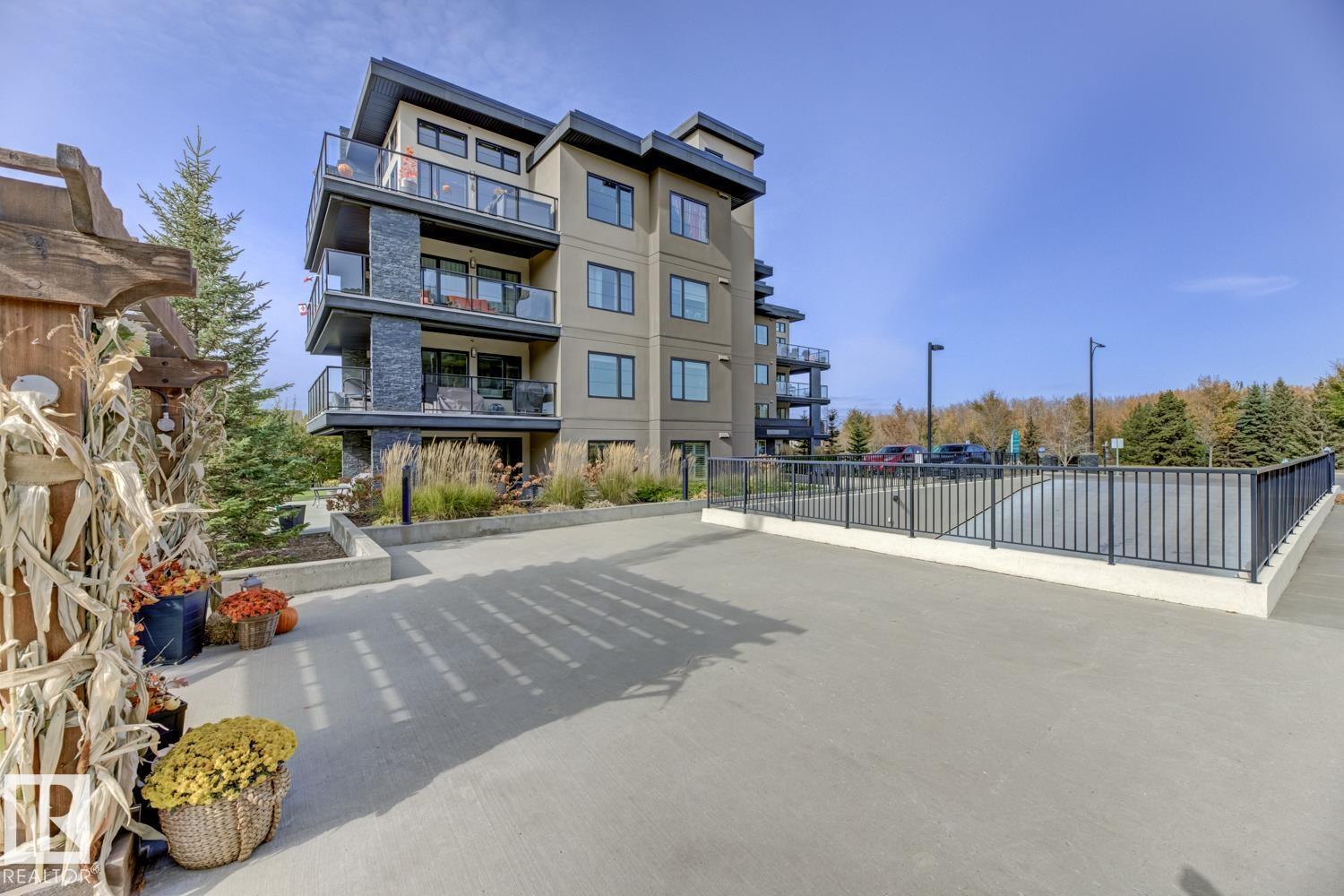 #210 5029 EDGEMONT BV NW