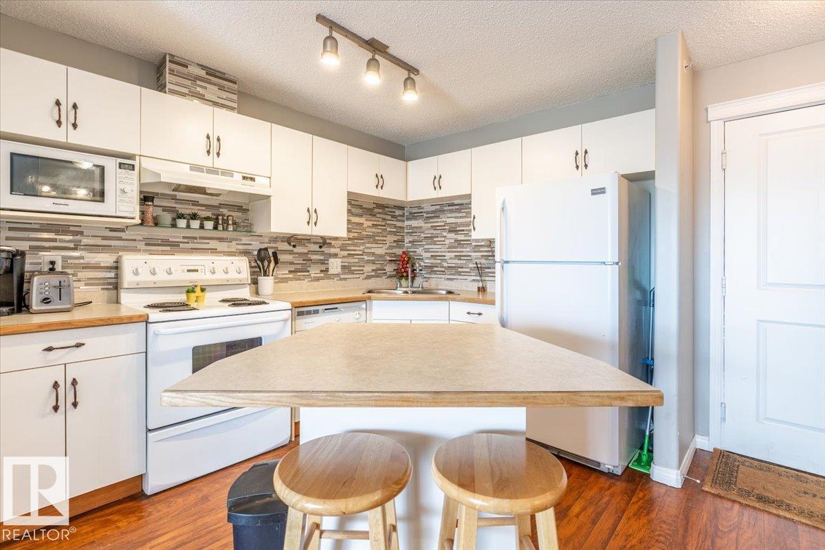 #523 10535 122 ST NW NW