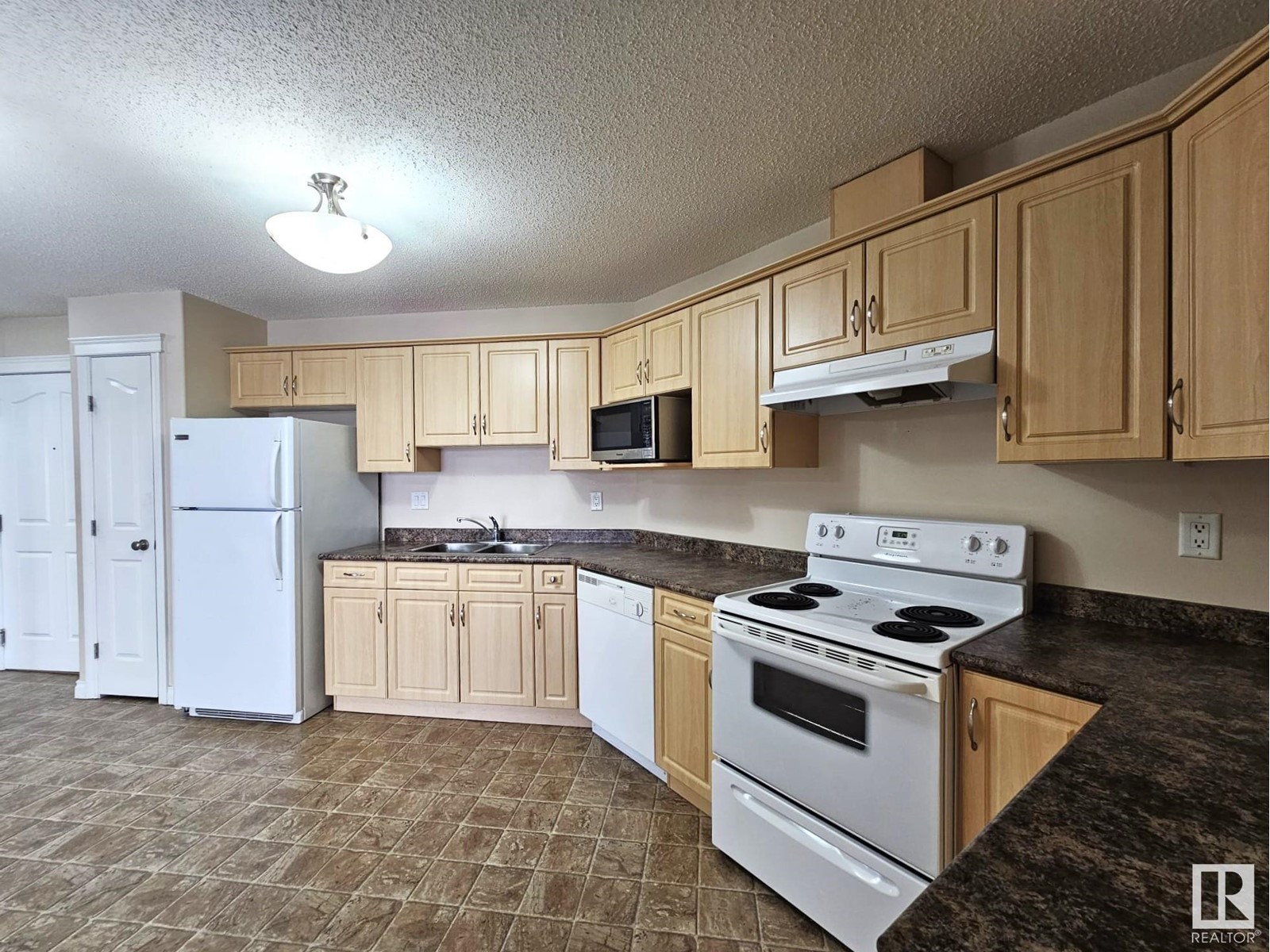 #415 7801 Golf Course Rd.
