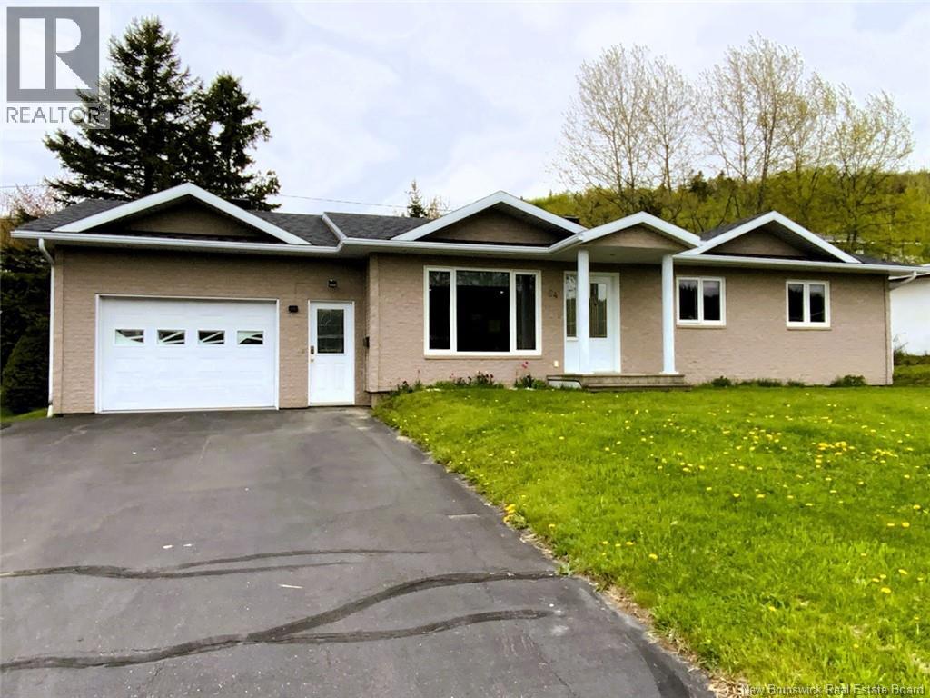 Photo 1 of 11 — 64 Chouinard Avenue, Edmundston, NB E3V3L8