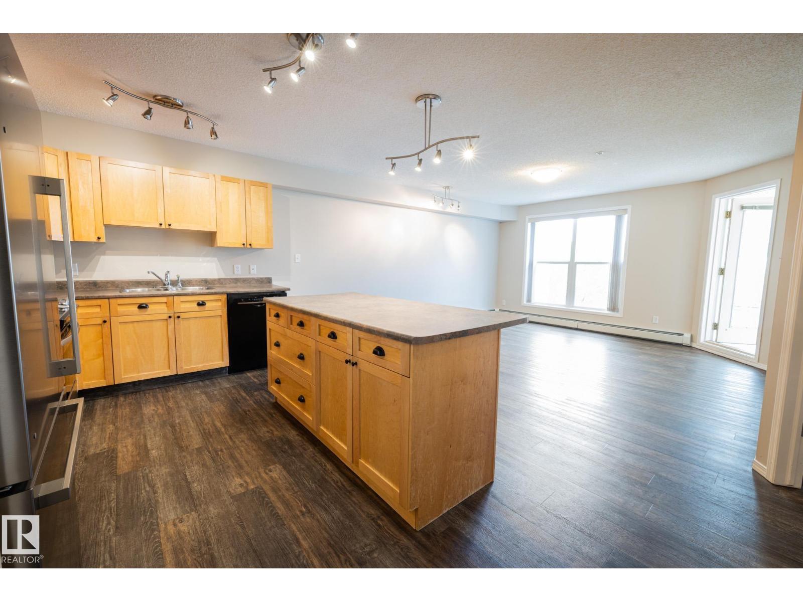 #406 10311 111 ST NW