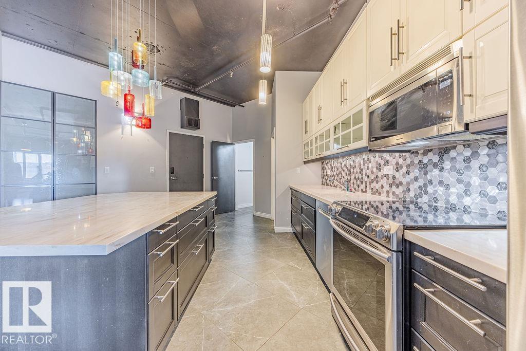 #303 10179 105 ST NW