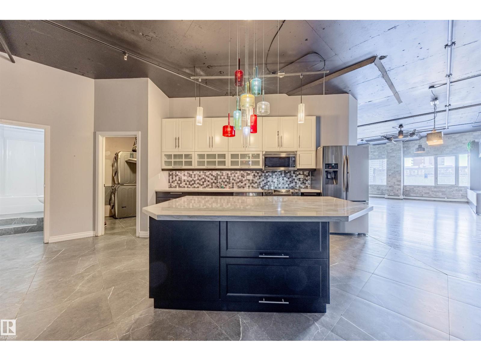 #303 10179 105 ST NW