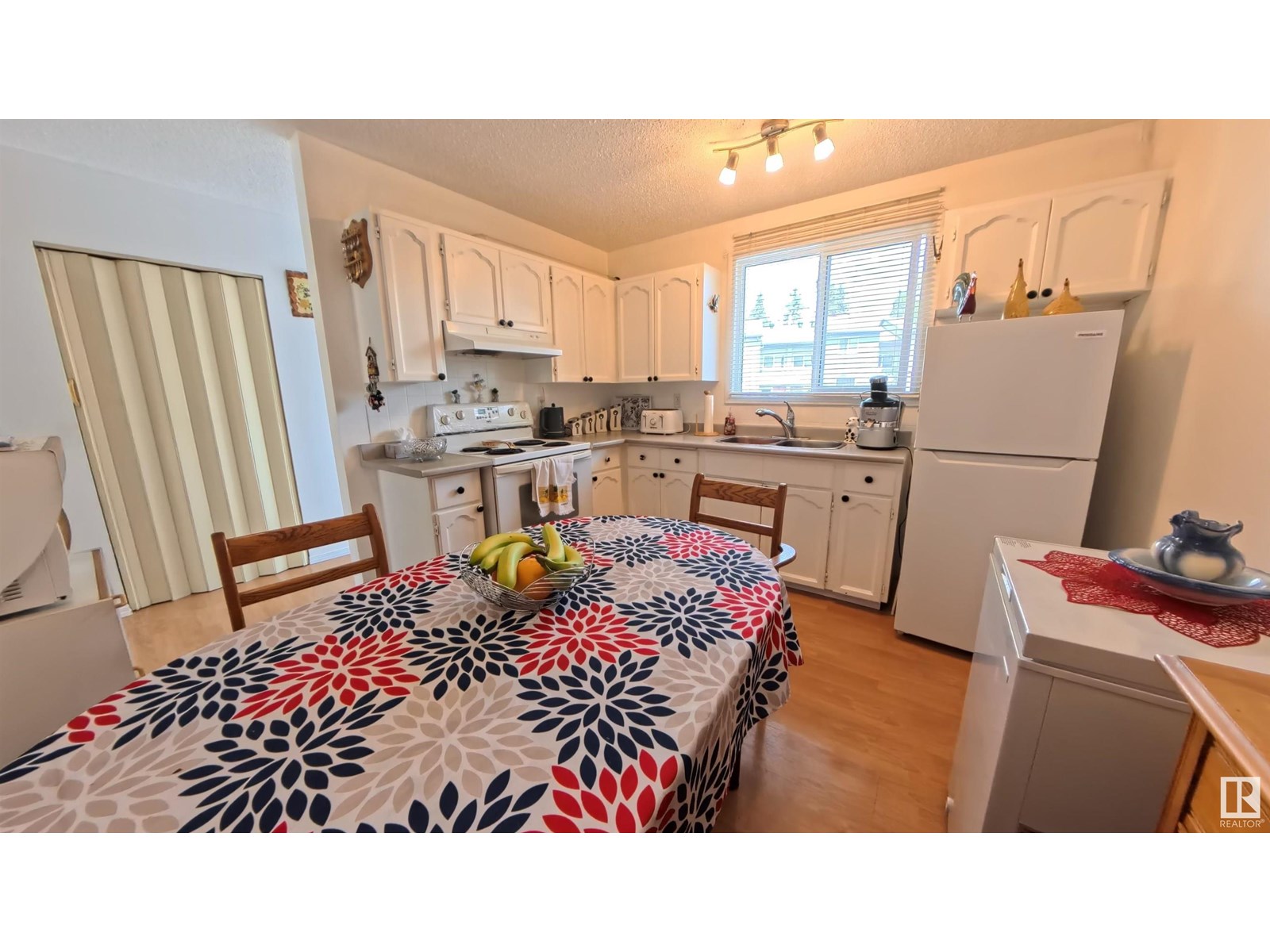 3122 142 AV NW