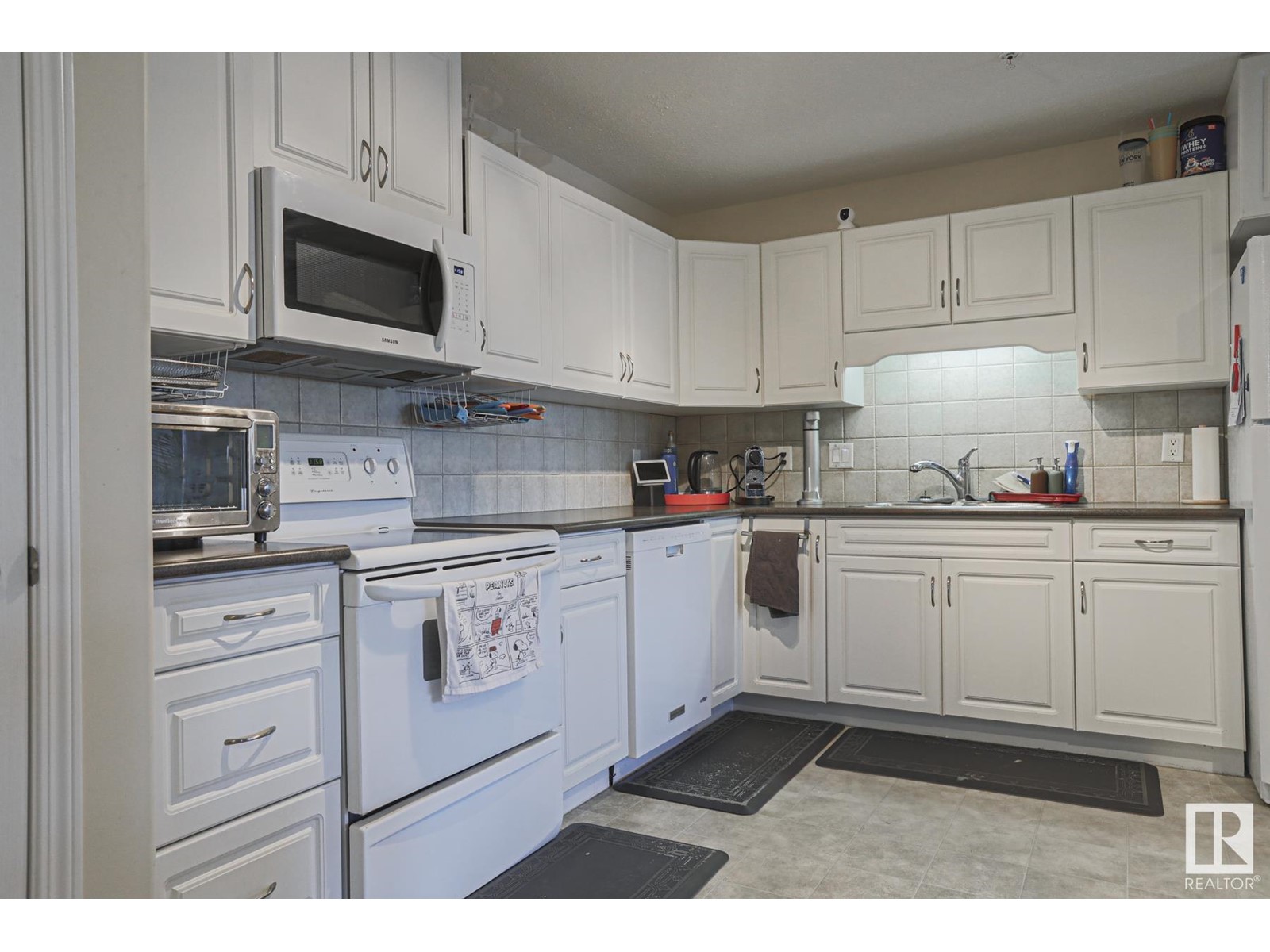 #409 261 Youville DR E NW